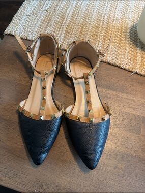 Stud-Trim Black Pointed T-Strap Flats with Tan Accents